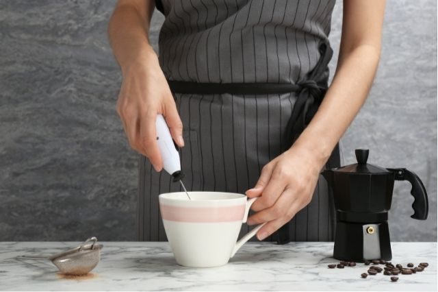 The woman making the Coffee Creamer at home